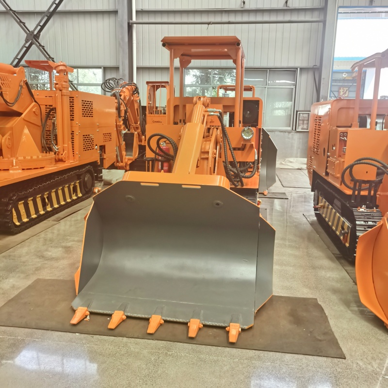 Cargador de rocas de descarga lateral