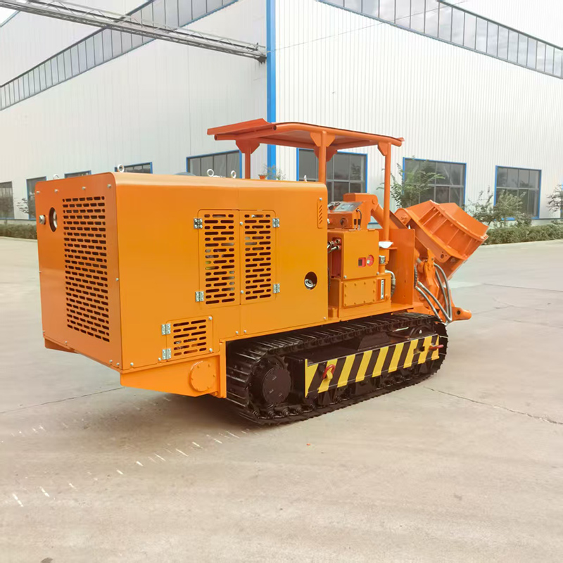 Cargadora de rocas con descarga lateral sobre orugas