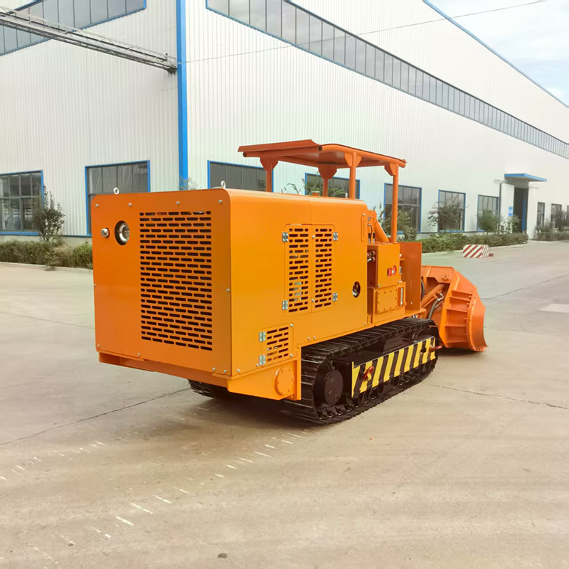 Chargeuse de roches à déchargement latéral de carrière