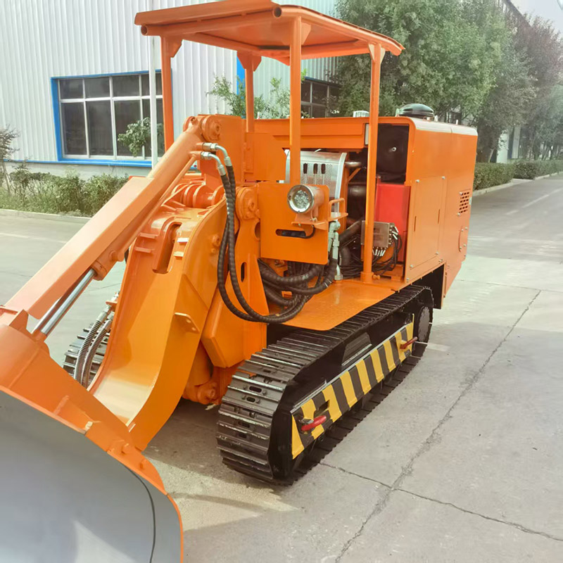 Máy bốc dỡ đá bên hông mỏ than