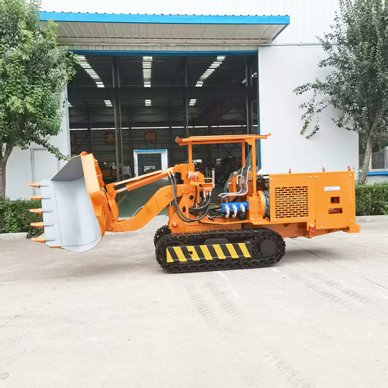 Cargador de rocas de descarga lateral mediana